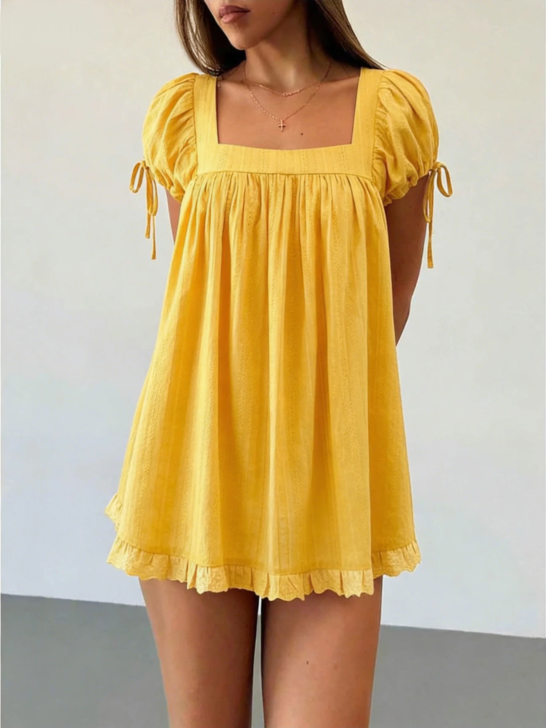 Women's yellow babydoll top, lightweight fabric, perfect for summer outings