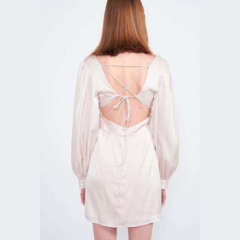 Back view of Emory Park back strap tulip mini dress with elegant tie detail and puff sleeves