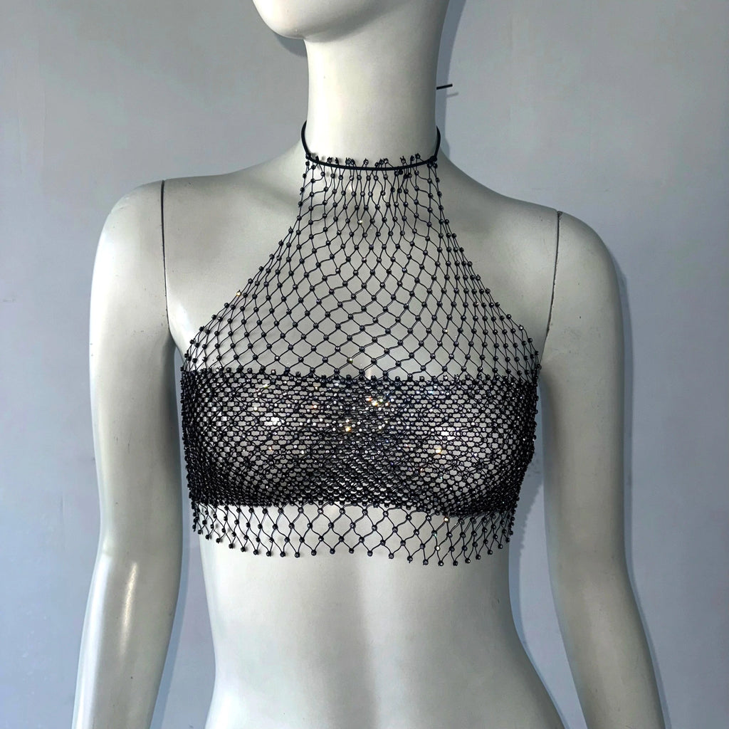 Black backless bandage clubwear tank with mesh net overlay on white mannequin by VacationGrabs