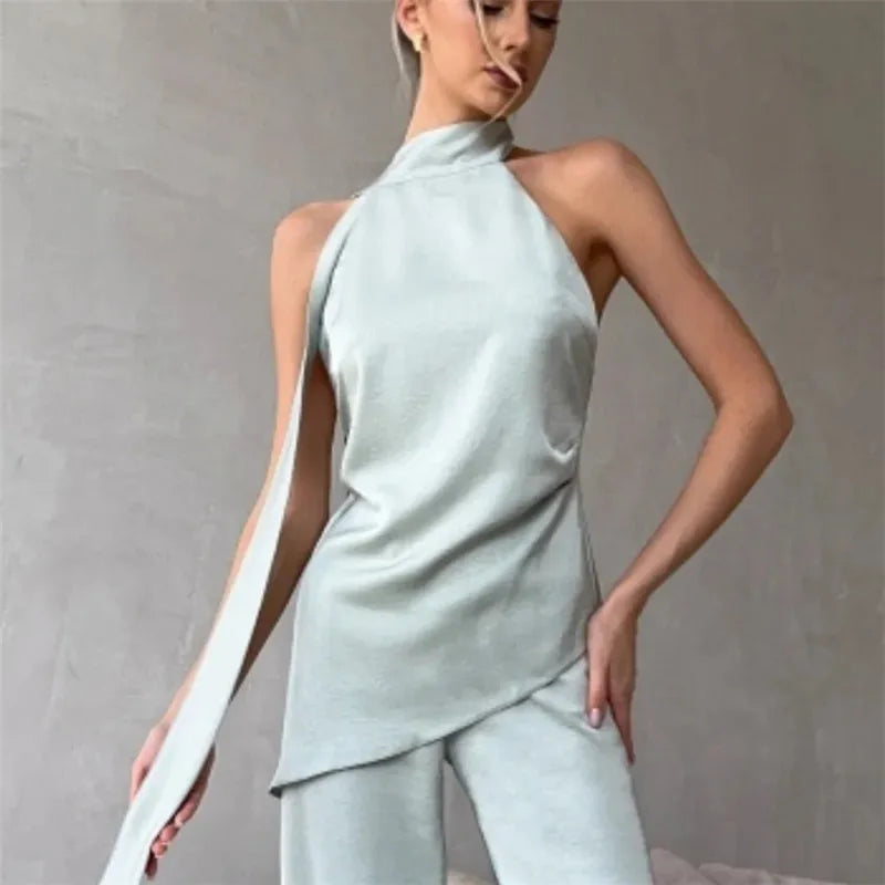 Women's backless top in pastel green, perfect for summer outings