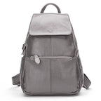 Gray leather backpack for travelling for women with multiple pockets