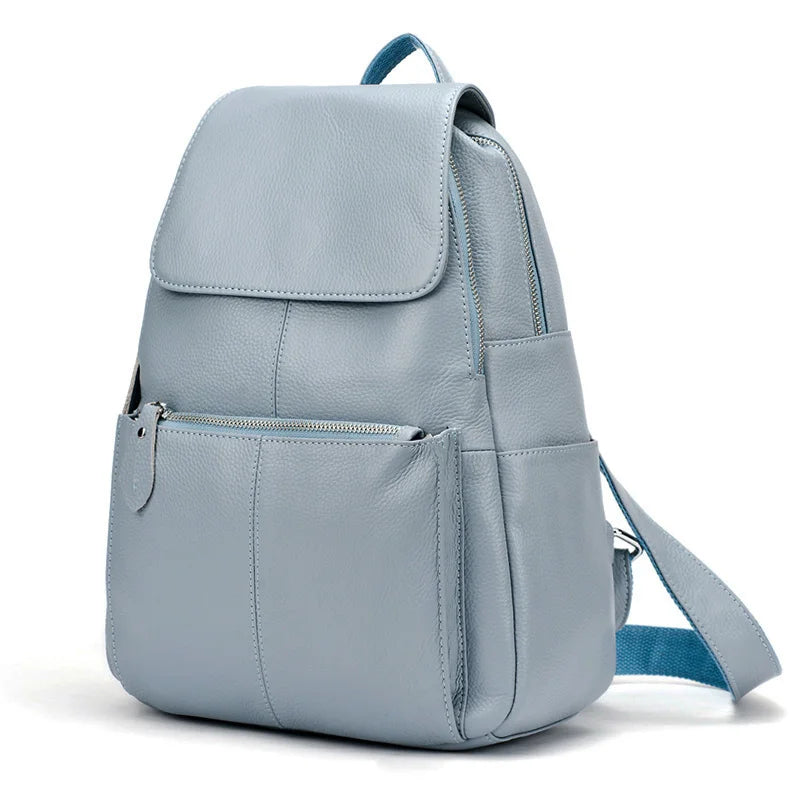 Light blue leather backpack for travelling for women with multiple pockets
