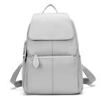 Light gray leather backpack for travelling for women with multiple pockets