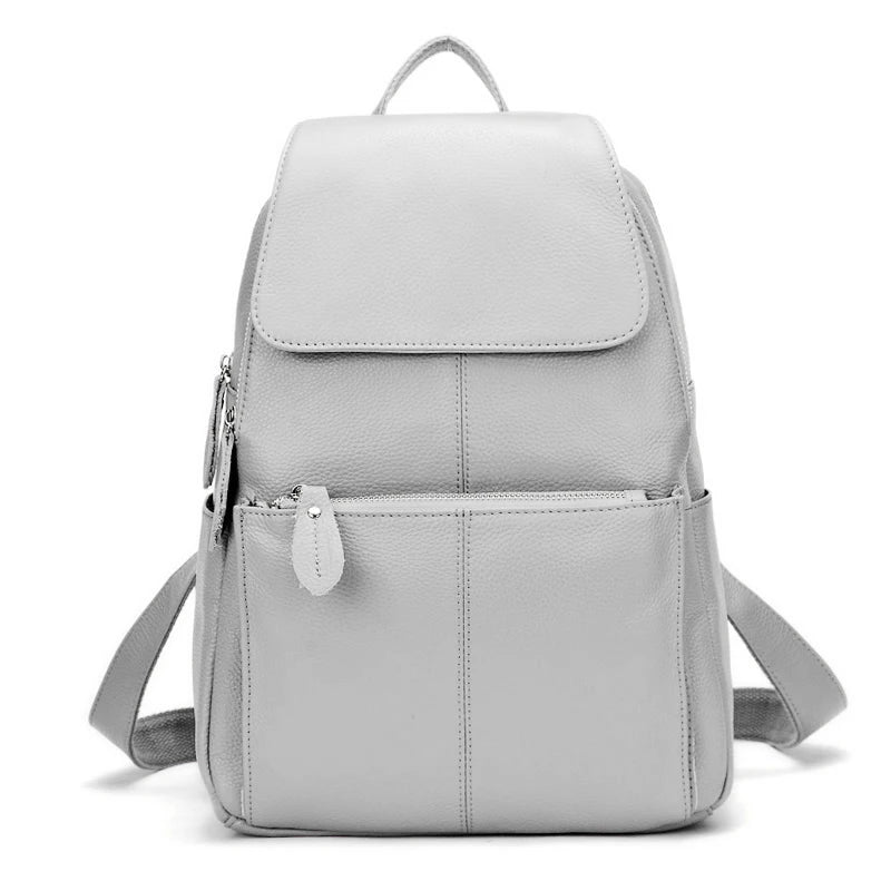 Light gray leather backpack for travelling for women with multiple pockets