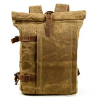 Brown canvas backpack with leather straps offering quality leather protection