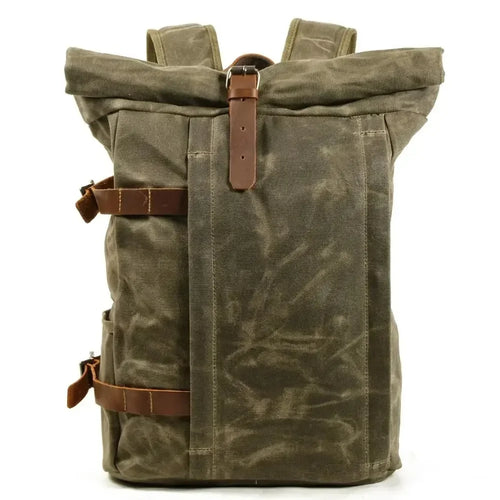 Brown canvas roll-top backpack with quality leather protection for outdoor adventures