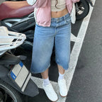 Women's baggy jean shorts in light blue for casual summer wear
