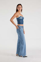 Women's baggy jeans in light blue denim, perfect for casual wear