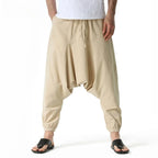 Men's baggy sweat pants in beige cotton, perfect for casual lounging