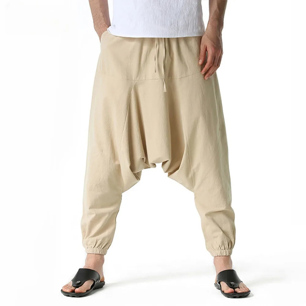 Men's baggy sweat pants in beige cotton, perfect for casual lounging