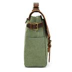 Green canvas messenger bag with leather strap for everyday use