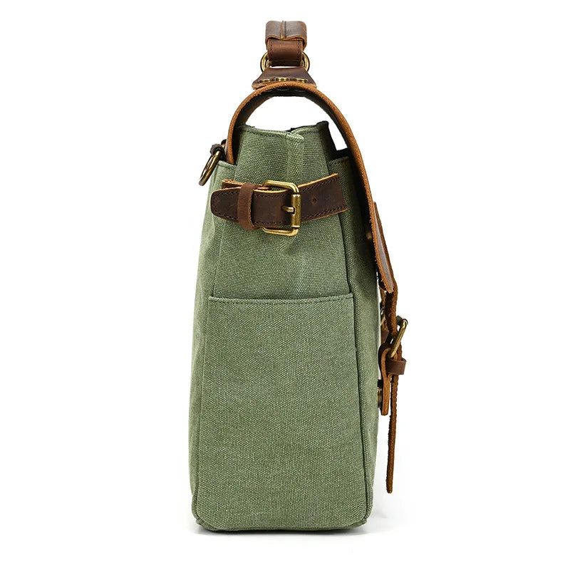 Green canvas messenger bag with leather strap for everyday use