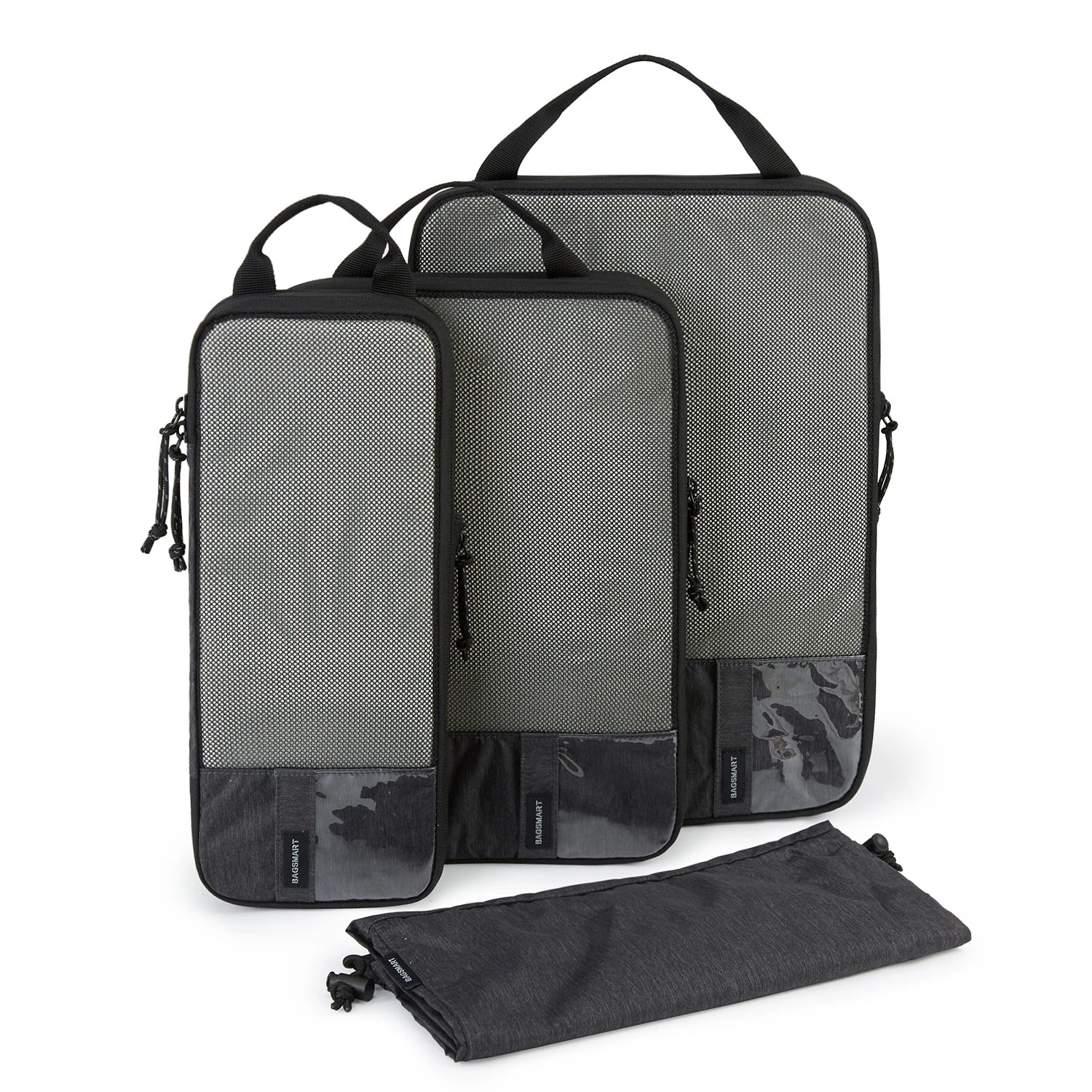 Set of three gray compression packing cubes for travel organization