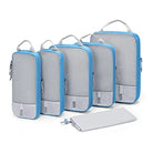 Compression packing cubes for travel in light blue and gray