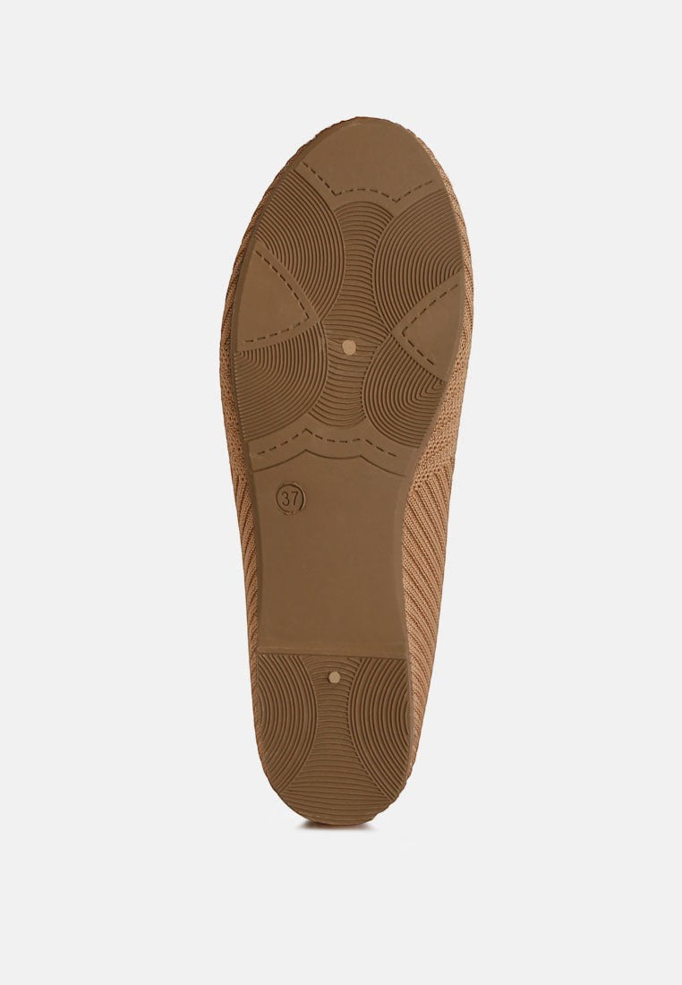 Women's tan ballet flats with soft material for everyday comfort