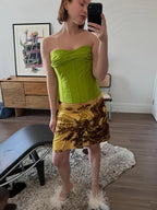 Green bandeau top in a fitted design, perfect for summer outings