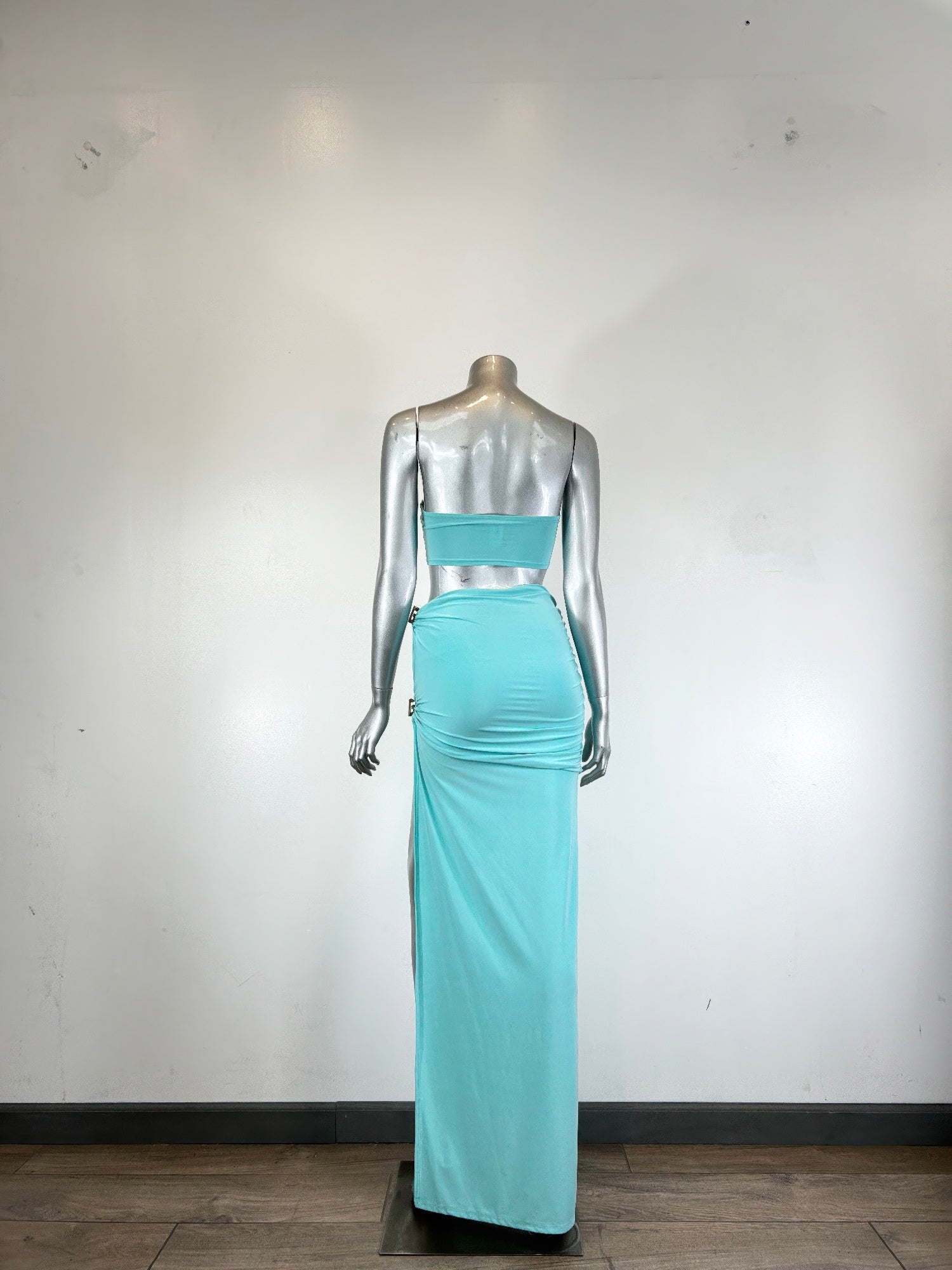 Women's bandeau two-piece skirt set in turquoise, perfect for summer parties