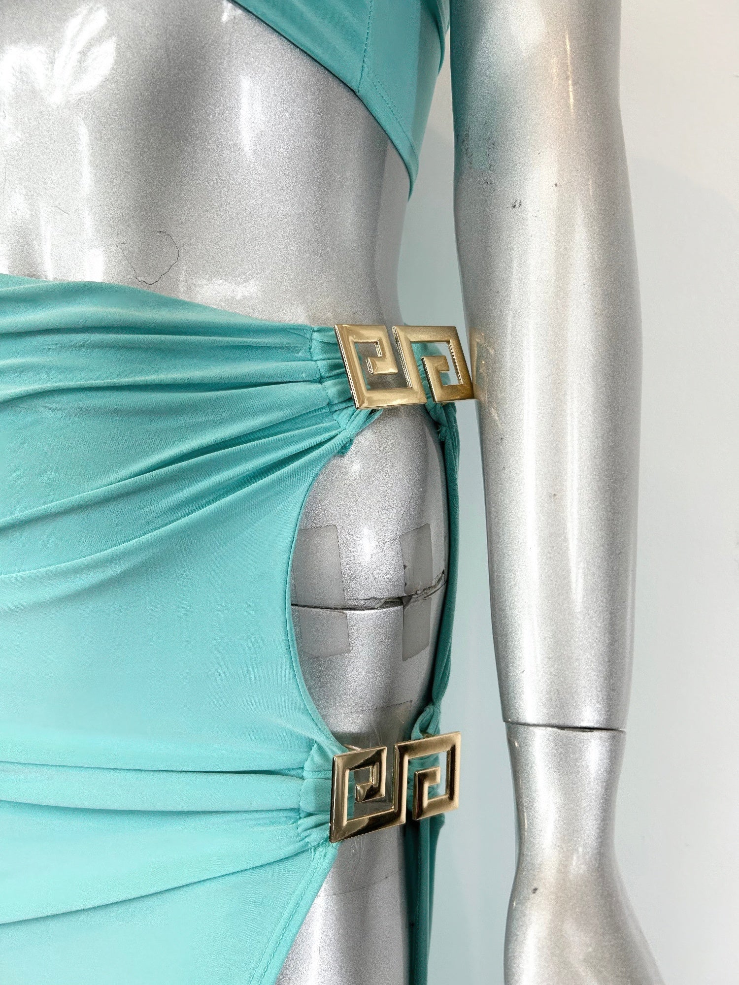 Women's bandeau two-piece skirt set in teal, perfect for clubwear
