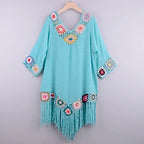 Turquoise crochet cover up for the beach with fringe detailing