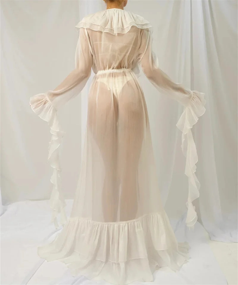 White sheer cover up for the beach with ruffled details