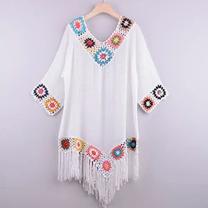 Women's white crochet cover up for the beach, with colorful floral accents