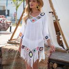 Women's white cover up for the beach with colorful embroidery and fringed hem