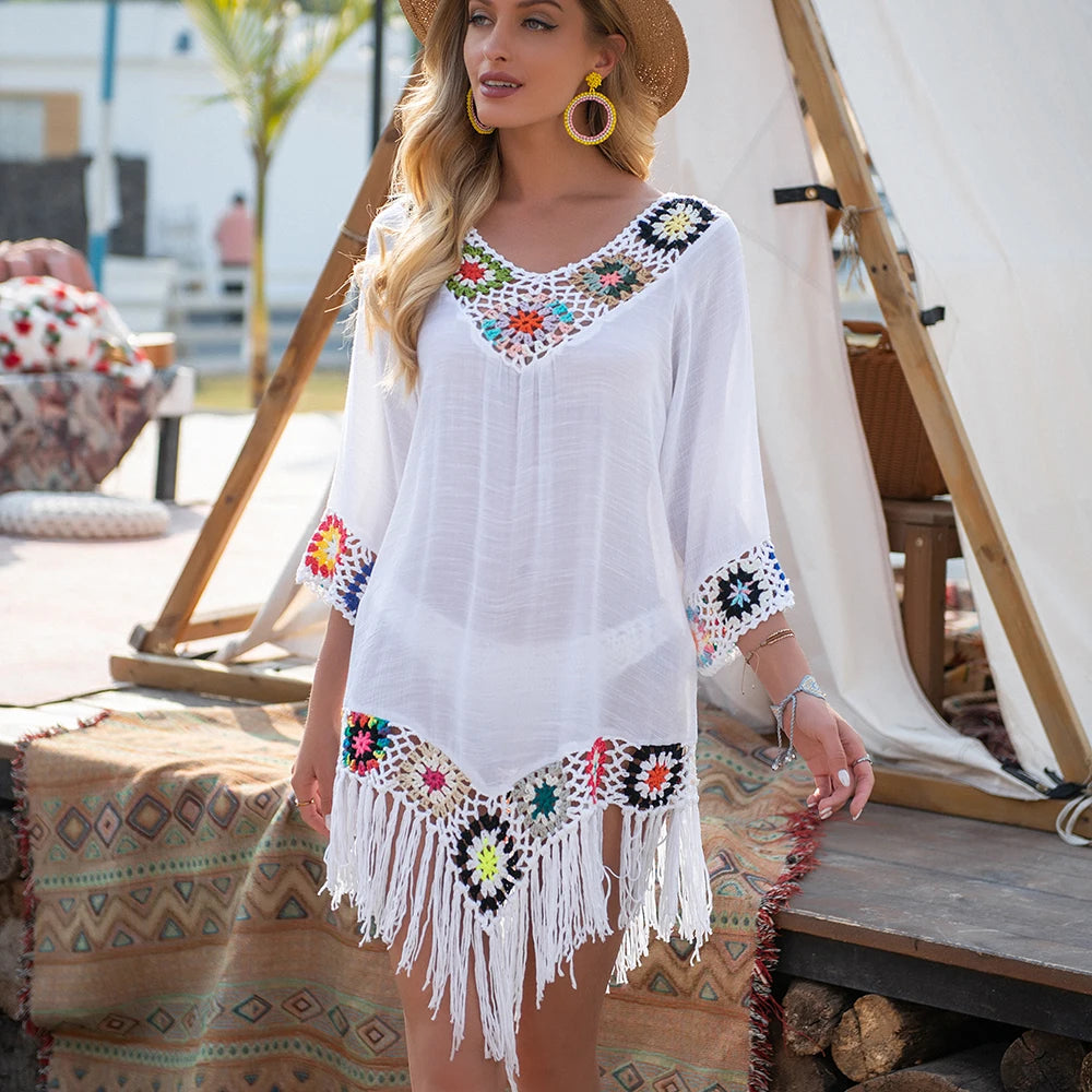Women's white cover up for the beach with colorful embroidery and fringed hem