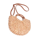 Stylish woven beach date night clutch bag with a leather strap for summer outings