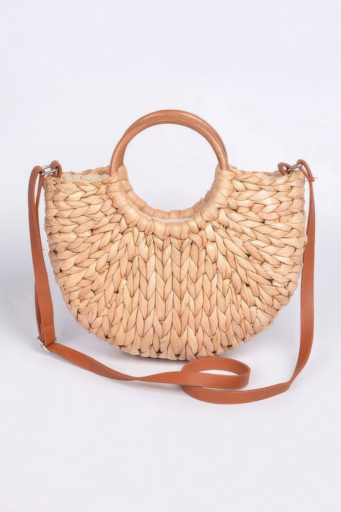 VacationGrabs beach date night clutch bag made of woven straw with a stylish circular handle