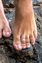 Delicate silver toe ring from Aili's Corner, perfect beach jewelry for vacation