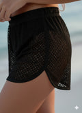 Women's black mesh beach shorts for stylish summer outings