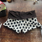 Men's black and white polka dot beach shorts for summer wear