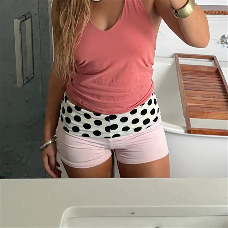 Men's pink beach shorts with polka dot waistband, perfect for summer fun