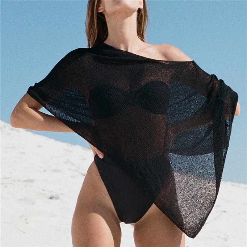 Women's sheer black cover-up, perfect for beachwear bathing suits