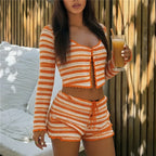 Women's orange striped beachwear bathing suits set, perfect for summer outings