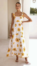 Women's floral maxi dress in white, perfect for beachwear bathing suits