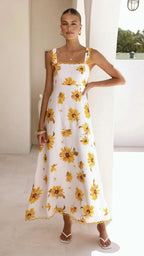 Women's floral maxi dress in white, perfect for beachwear bathing suits