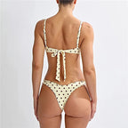 Women's polka dot bikini set in cream, perfect for beachwear bathing suits