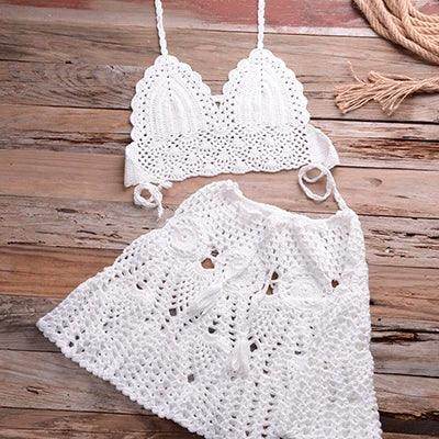 Elegant white crochet beachwear cover up with a stylish bralette and skirt design for summer outings