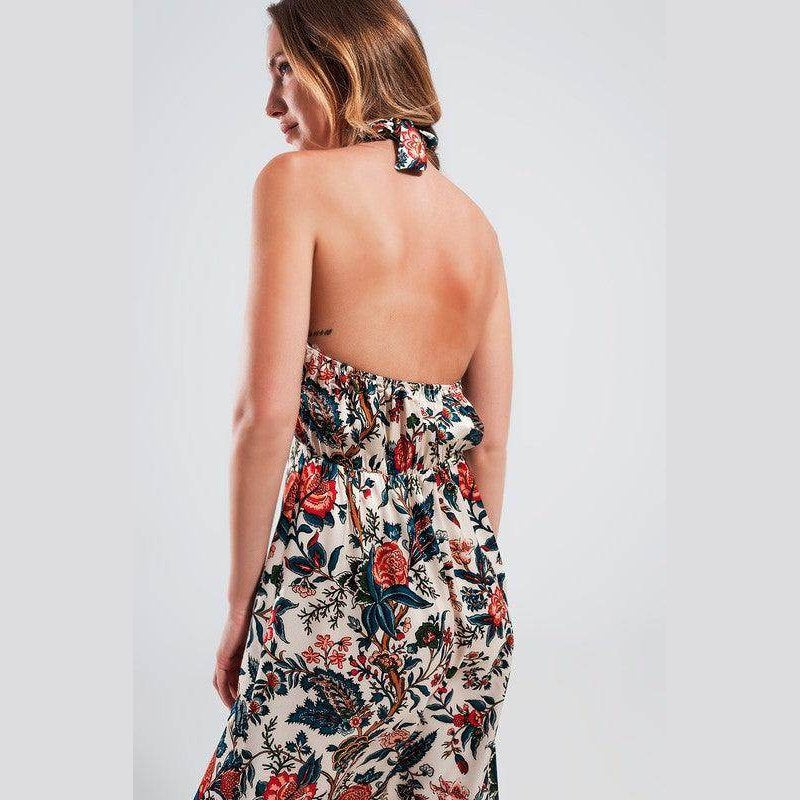 Stylish beige paisley maxi dress featuring a backless design and floral patterns for a chic summer look