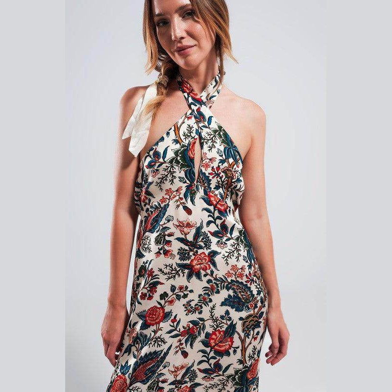 Stylish women's beige paisley maxi dress with a halter neck and floral patterns