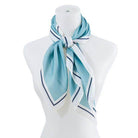Stylish beige silk scarf by Bella Chic, perfect for adding elegance to any outfit