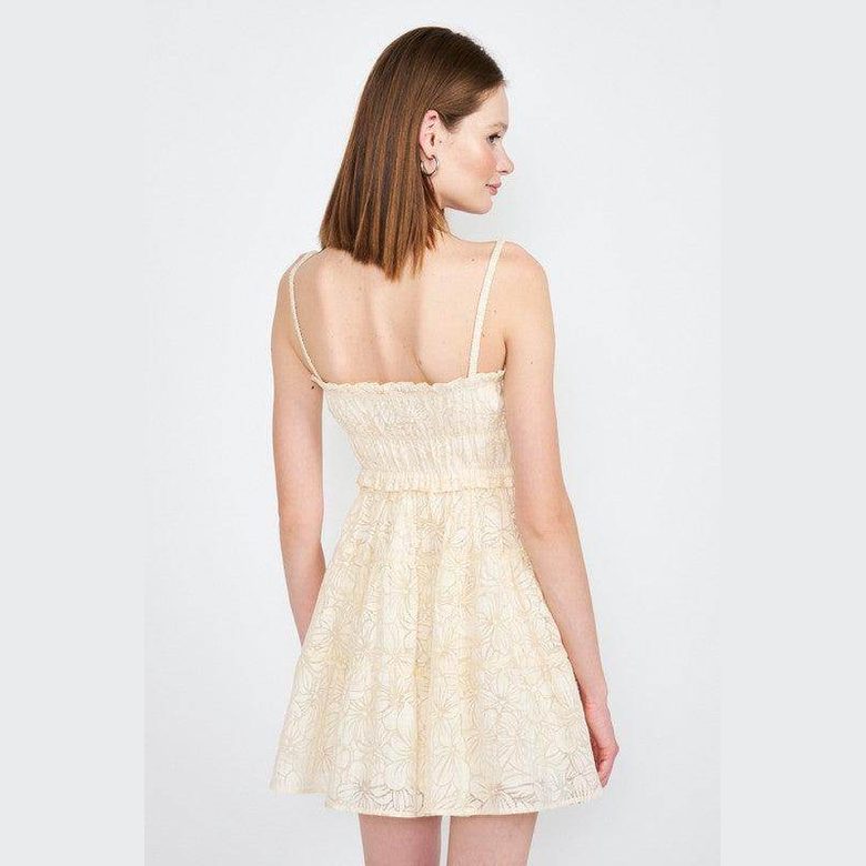 Emory Park beige spaghetti strap dress with a floral pattern and smocked bodice, perfect for summer outings