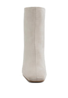 Beige square toe heeled booties by Rag Company featuring a sleek and minimalist design