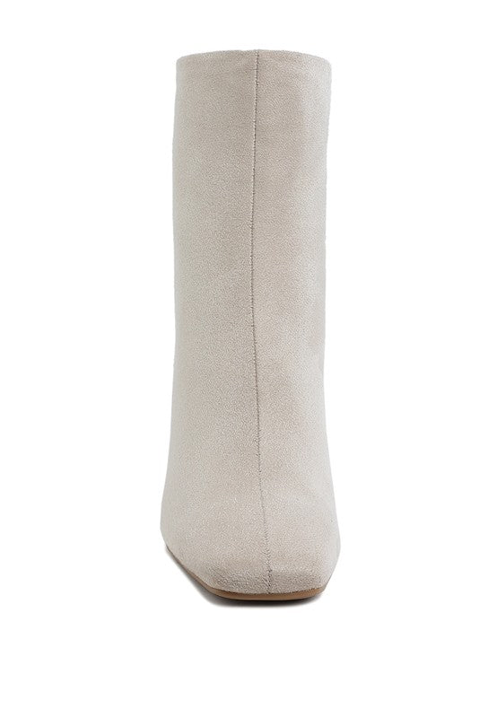 Beige square toe heeled booties by Rag Company featuring a sleek and minimalist design