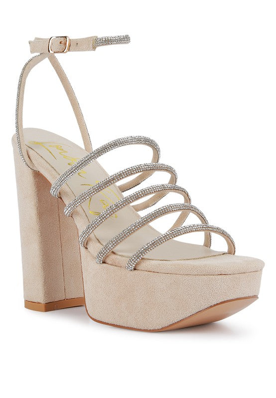 Women's black strappy platform sandals with sparkling details, perfect for parties