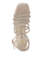 Women's black strappy platform sandals with elegant design for evening wear