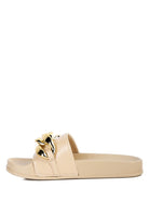 Beige Rag Company stylish vacation sandals for women with gold buckle detail and flat sole