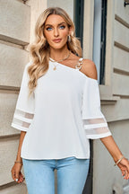 Women's white top with bell sleeve, stylish for casual outings