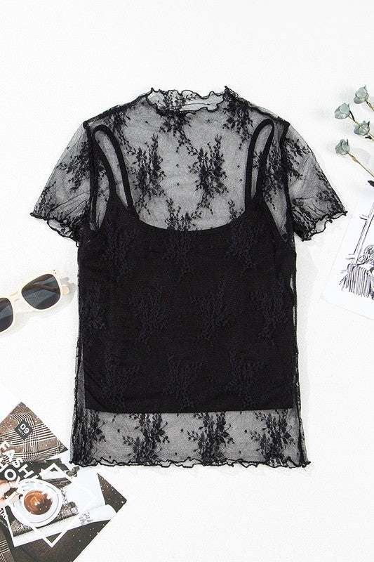 YNIQUE black floral sheer mesh blouse with short sleeves layered over black camisole flat lay